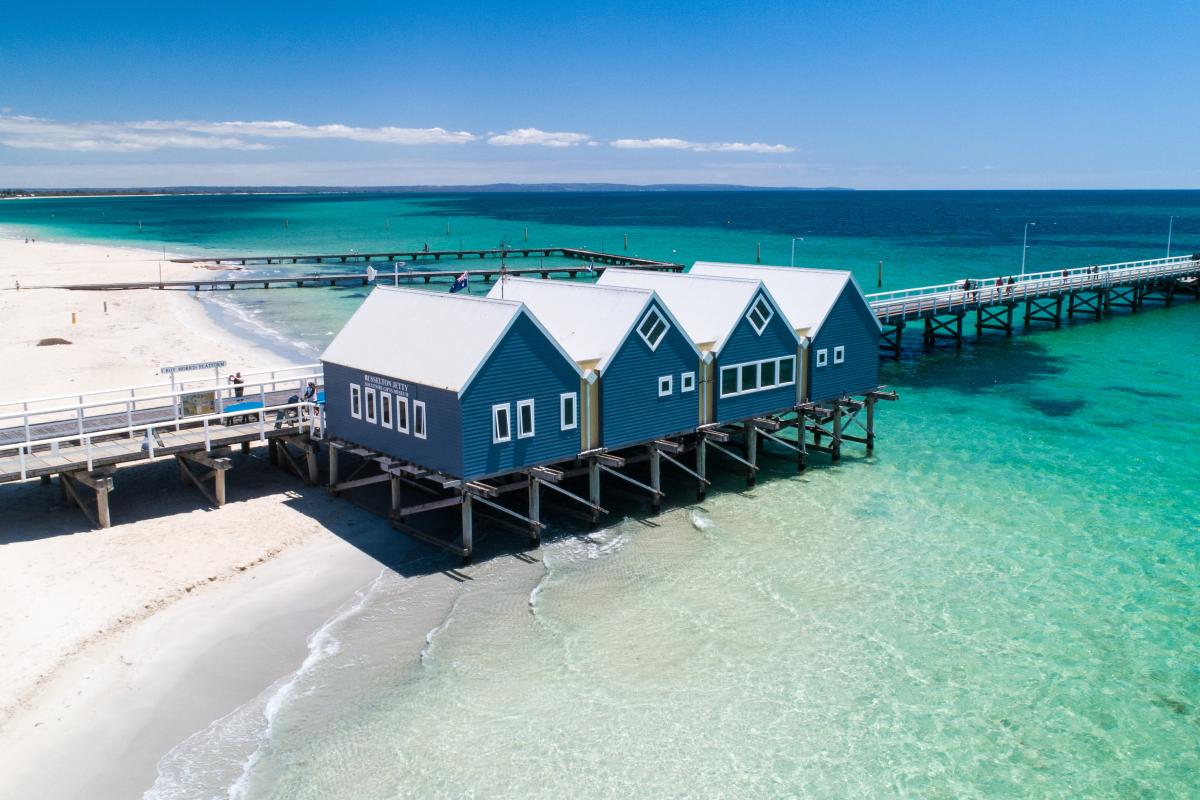 Blue beach houses at start of Busselton Jetty